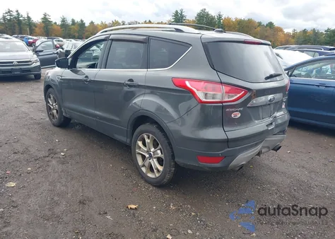 2016 Ford Escape Titanium z USA, uszkodzony, nr VIN 1FMCU9J95GUB49828